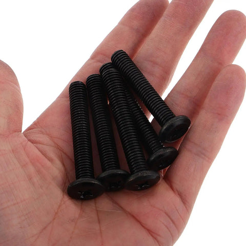 Heavy Duty Tv Mounting Hardware Kit With Wall Mount Standoffs And Screws For Home And Office Use Includes Metal Corner Brackets And Universal Fit For Secure Quick Installation And Hassle Free Setup featuring universal screws in hand.
