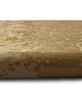 Water droplets on a wood surface treated with Top Notch Food Safe Hard Wax Oil For Kitchen Countertops And Interior Woodwork Solvent Free Water Repellent Wood Finish Sealant Ridiculously Durable Surface Guard.