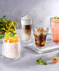 Heavy Hitting Double Wall Glass Coffee Tumblers Set Of Two Features Wave Borosilicate Build and Zero Sweat Outer Shell with iced and hot beverages.