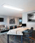 Modern office with Dimmable 2 Foot LED Wraparound Light With 3 CCT Adjustable 3000K 4000K 5000K, 50W 5500 Lumens, flush mounted on ceiling.