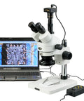 Trinocular Zoom Stereo Microscope 3.5X To 90X With Long Working Distance, 144 LED Four Zone Lighting System, Pillar Stand, 10X Super Widefield Eyepieces, Adjustable Interpupillary, Perfect For Circuit Boards And Dental Appliances. Trinocular microscope shown with laptop and pillar stand.