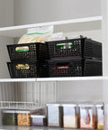 Stackable Woven Plastic Storage Baskets 6 Pack For Cabinet Closet Shelf Under Sink Countertop Pantry Organizer Bins With Extra Large Capacity For Kitchen And Bathroom Organization with black design on a shelf storing goods