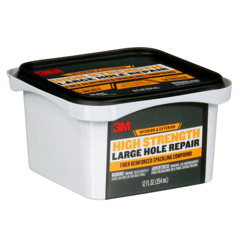 Heavy Duty Fiber Reinforced Spackling Compound, 12 Oz, For Large Hole Repairs In Drywall Plaster Stucco Concrete And Wood, 5x Faster Fix For Holes 3 To 5 Inches, Interior Or Exterior When Sealed With Paint in a white container with black lid.