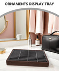 Premium Wooden Jewelry Tray Featuring Forty Smooth Compartments And Plush Velvet Insert For Classic Bracelet And Bangle Display Stand Plus Reliable Countertop Organizer That Straight Up Hits Different on a countertop with beauty products.