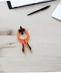 Phone Screen Opening Tool With Durable Suction Cup And LCD Separation Pliers for Quick DIY Repairs on a wooden desk