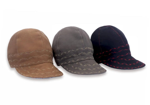 Three Workhorse Flame Resistant Welding Caps in brown, gray, and black, 10 oz cotton duck exterior, six panel design.