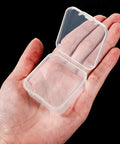 Hand holding one box from Six Piece Mini Clear Plastic Storage Containers Set for Beads Jewelry Craft Supplies Small Parts 1.7 x 1.7 x 0.8 Inch