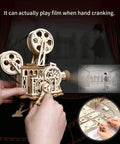 3D Wooden Puzzle Kit For Adults, 183 Piece Mechanical Model Build, Vintage Movie Projector Craft, Hand Crank Power, No Battery Required, Realistic Animations In Darkness, Sweet Gift For Adults 14 Plus, hand-crank wooden projector in use