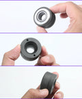 Close-up of hand holding Wheel Stud Installer Tool For Cars And Light Trucks, Pro Grade Carbon Steel, rust-resistant finish