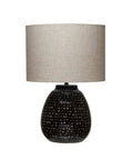 Stoneware Table Lamp in Black and White for Nightstands with black base, white dot pattern, ceramic, cozy vibe and warm glow.