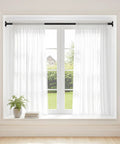 32 To 90 Inch Adjustable Tension Curtain Rod In Black No Drill Easy Install For Patio Windows Bathroom Closet And Doorway With Strong Spring Tension And Quick Twist End Caps in a window setting