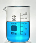 400ml Borosilicate Glass Beaker Set Low Form With Graduations And Pouring Spout 8 Pack Lab Grade Glass filled with blue liquid