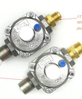 Two metal propane pressure regulators for lawn and patio with 1/2 MNPT inlet/outlet fittings and blue caps