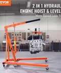 Heavy Duty 2 Ton Engine Hoist Folding Cherry Picker Shop Crane With Hydraulic Pump Six Rolling Casters lifting an engine block.
