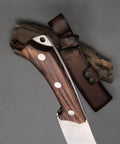 Close-up of wooden handle on Beefy Dual Purpose Kitchen And Outdoor Cleaver For Bone Chopping And Bushcraft Wood Splitting Ultra Sharp 80 Degree Blade