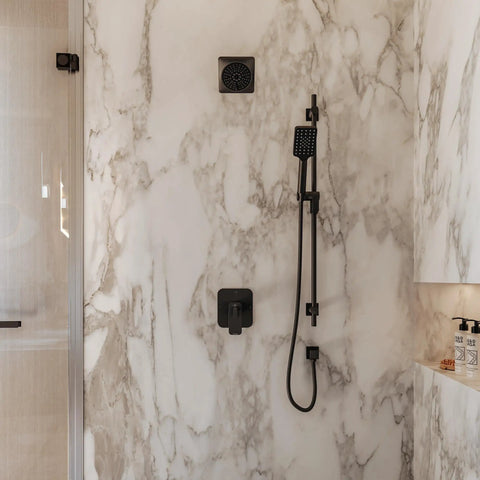 Stylish bathroom with heavy duty 59 inch metal shower hose assembly in matte black finish for handheld sprayers.