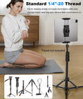 Tablet And Phone Tripod Mount Adapter With 1/4 Inch Thread And 17mm Ball Head holding tablet on yoga mat