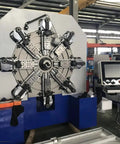 Rock Solid Six Axis Cnc Wire Spring Machine With Slick Automatic Coiling showing multi-axis coiling capabilities in workshop.
