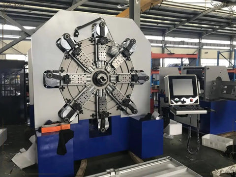 Rock Solid Six Axis Cnc Wire Spring Machine With Slick Automatic Coiling showing multi-axis coiling capabilities in workshop.