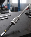 Rock Solid Heavy Duty Internal Bearing Puller Double Head Extractor Kit For Mechanics Removing Stubborn Internal Components Without Damaging Machinery Essential Garage Tool That Is The Real Deal For Your Shop Or Home DIY Project. steel bearing puller on workbench