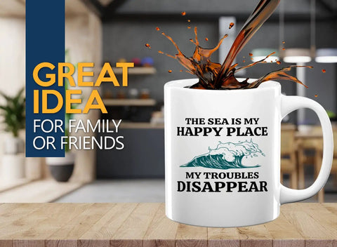Morning Brew Sailor Coffee Mug 11oz White For Boaters And Sailors With Funny Lake Vibes Gift For The Captain In Your Life Ideal Gift For Sailor Lovers And Boat Crew, ceramic mug with wave design and text 'The Sea is My Happy Place, My Troubles Disappear' on table.