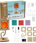 Components of Levitating Lantern STEM Kit for Kids 9 Plus with wooden lamp, tensegrity base, and wiring elements displayed