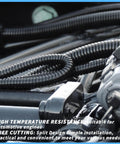 Automotive engine with Split Wire Loom Tubing Kit With Five Size Options demonstrating cable protection and organization
