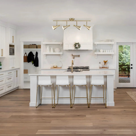 Sabrina 4-Light Matte Brass Track Lighting With Pivoting Heads in modern kitchen setting, highlighting stylish spotlight bar.