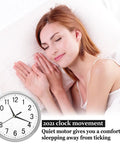 Woman sleeping peacefully next to wall clock showing quiet motor feature from DIY Clock Repair Kit With Four High Torque Long Shaft Movements.