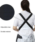 Back view of Transparent Waterproof Hair Stylist Apron With Adjustable Straps, 29.5 Inch Length, showing adjustable cross straps