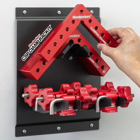 Clamping Squares Plus With Rack It Storage Mount For A Beefy Heavy Duty Workshop Organizer Wall Mounted Storage For Clamps And Accessories USA Made Powder Coated Finish Built To Last wall-mounted rack holding red clamping squares and CSP clamps