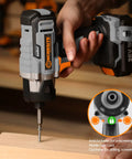 Cordless Impact Driver Kit Delivers Beastly 2655 Inch Pounds Torque For All Your Fastening Needs Quarter Inch All Metal Hex Chuck Variable Speed Comes With 2 Amp Battery One Hour Charger 26 Impact Bits And Handy Tool Bag in use with wooden project.