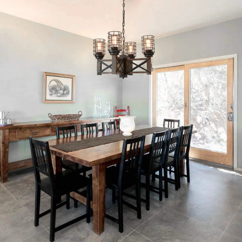 Dining room with Wood Farmhouse Cage Chandelier Four Light Pendant For Kitchen Island Industrial Chic Dining Table Vintage Edison Ceiling Light Brown And Black Rustic Fixture over wooden table.
