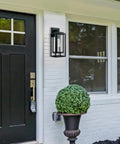 14 Inch Double Cage Outdoor Wall Lights 2 Pack Exterior Porch Lantern Sconces mounted next to a door on a white wall.