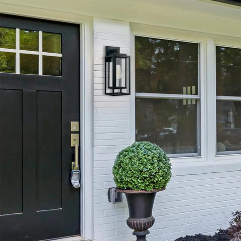 14 Inch Double Cage Outdoor Wall Lights 2 Pack Exterior Porch Lantern Sconces mounted next to a door on a white wall.