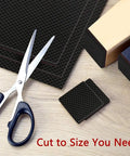 Scissors cutting Grippy Non Slip Furniture Pads 12 Pack 4 Inch Self Adhesive Rubber Feet For Couch Tables Chairs Shield Hardwood Floors From Scratches And Slips No More Dragging Or Scrapes to size on a table.