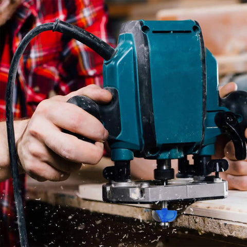 Person using power tool with 24 Piece 1/4 Inch Shank Router Bit Set With T Shape Bits For Pros And Beginners Heavy Duty Steel Body for woodworking.