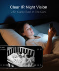 Woman using 2.5K Indoor Security Camera 4 Pack With Free AI Person Pet Cry Detection, viewing night vision baby monitor app in bed