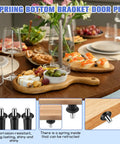 Bully Proof Spring Pin Set For Cabinet Door Dampers And Drawer Hinges 24 Pack shown on a dining table alongside dishes.