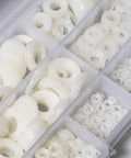 Heavy Duty Nylon Flat Washers Assortment Kit For Mechanical And Electrical Jobs, top view of assorted white PA66 flat washers in containers.