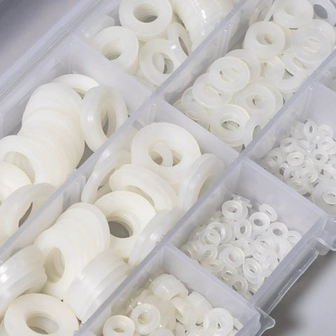 Heavy Duty Nylon Flat Washers Assortment Kit For Mechanical And Electrical Jobs, top view of assorted white PA66 flat washers in containers.