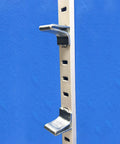 Adjustable Steel Pilaster Shelf Support Clips Set of 14 with Zinc Finish for Standard Shelving Systems installed on blue wall.