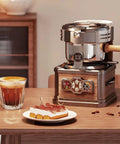 Home And Cafe Coffee Bean Roaster With Eight Heat Settings Dead Quiet Operation Precise Temperature Control sitting on a table with coffee.