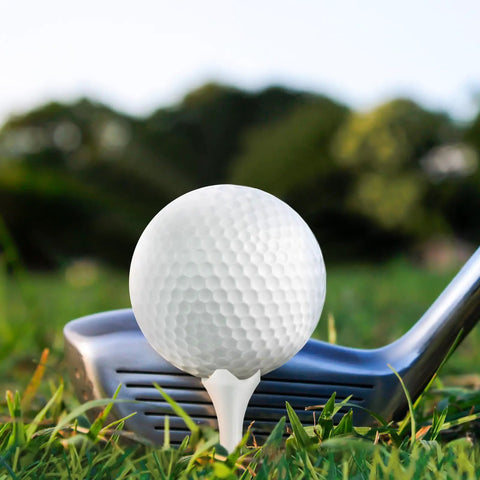 Golf club with ball on 1.5 Inch Plastic Golf Tees Pack Of 120 With Low Friction Tech, focus on tee stability and use