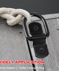 Close-up of a black D ring tie down anchor with rope for secure lashing, part of the 24 Pack Heavy Duty D Rings Tie Down Anchors Built Different With Swiveling Mounts Rugged Quarter Inch Steel Lashing Hooks Handle Gnarly Loads Up To 2400 Pounds For Pickup Truck Trailer Cargo.