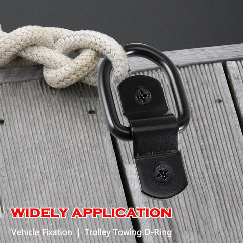 Close-up of a black D ring tie down anchor with rope for secure lashing, part of the 24 Pack Heavy Duty D Rings Tie Down Anchors Built Different With Swiveling Mounts Rugged Quarter Inch Steel Lashing Hooks Handle Gnarly Loads Up To 2400 Pounds For Pickup Truck Trailer Cargo.