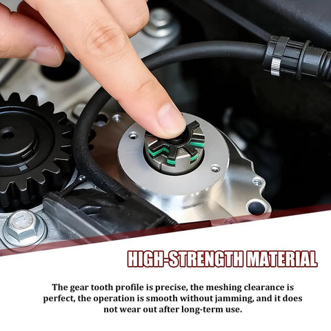 Close-up of a finger pressing a gear on a power steering motor shaft damper kit made of durable rubber and plastic.