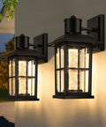 Crystal Bubble Glass Outdoor Wall Lanterns 2 Pack mounted, starry glow from waterproof black frame on wall.