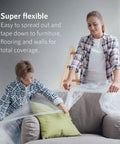 Mother and child using Bulk 30 Pack Painter Plastic Drop Cloths For Painting 9x12 Tarp Plastic Sheeting to cover a chair