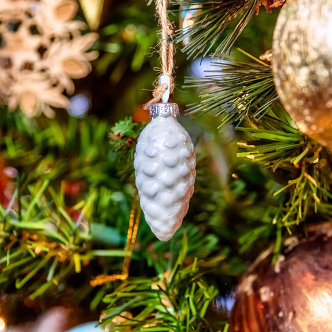 Tough As Nails Zinc Plated Eye Lag Screws In A Solid 100 Pack Plus A Handy Hook Driver For Snagging Drop Ceiling Hangers And Locking Wire Tight To Wooden Joists No Sweat Indoors Or Out, decorative pinecone ornament hanging on a Christmas tree.